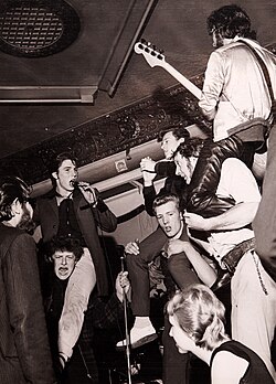 Teddy Boys playing music at the Queens Hotel, 1977