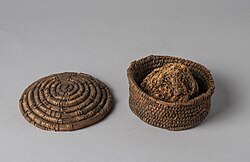 Piece of sorghum bread contained in basket, Predynastic Egypt, c. 3100 BCE (5,100 years ago). Egyptian Museum, Turin[24]