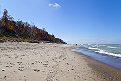 Lake Michigan is shared by Illinois, Indiana, Michigan, and Wisconsin. Pictured is Indiana Dunes National Park in northwest Indiana.