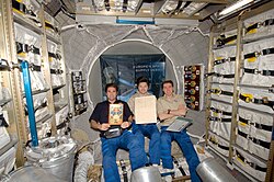 Original Jules Verne manuscripts displayed by crew inside the Jules Verne ATV (Automated Transfer Vehicle)