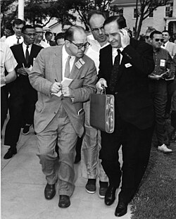 Faubus speaking to reporters after his meeting with Eisenhower at the Newport Naval Base, September 14, 1957.