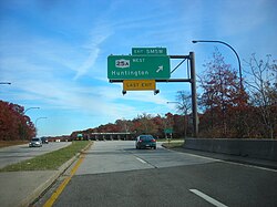 The Sunken Meadow State Parkway northbound at the toll barrier for Sunken Meadow State Park and exit SM5W, a ramp to NY 25A west