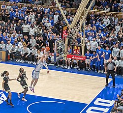 Cooper Flagg (formerly of Duke) getting a dunk against Wake Forest in 2025.