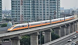 Whoosh high-speed train passing through Bekasi city