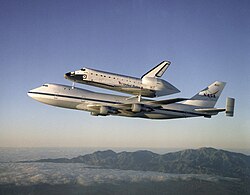 Atlantis atop Shuttle Carrier Aircraft N905NA after being repainted with NASA livery in 1998