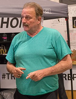 Roberts talking at a wrestling seminar in 2016