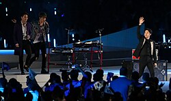 2014 Asian Games opening ceremony, JYJ performing, "Only One". Left to right: Junsu, Jaejoong, Yoochun.
