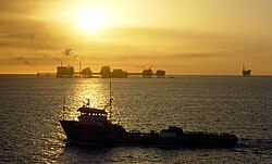 Ship and oil rigs in the gulf (2002)