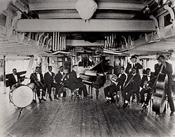 Armstrong (fourth from left) was a member of Fate Marable's New Orleans Band in 1919, shown here on board the S.S. Sidney.