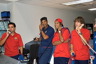 Rijkaard (second from left) with Xavi, Ronaldinho and Puyol at NASA in 2006