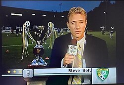 Steve Bell in 2008 with the original trophy given to the winners of the USL First Division.