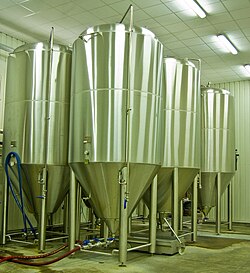 Fermenting tanks with yeast being used to brew beer