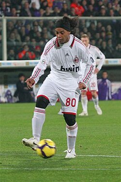 Ronaldinho playing for Milan in 2010 wearing number 80—the year of his birth[81]
