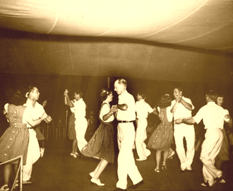 The Bent Creek Ranch Square Dance Team dancing at the Mountain Music Festival in Asheville, North Carolina.