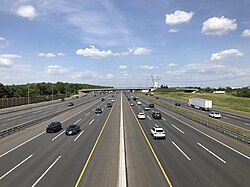 View northward of 14 lanes at Exit 7A of the New Jersey Turnpike (Interstate 95) as seen from the Interstate 195 (Central Jersey Expressway) overpass