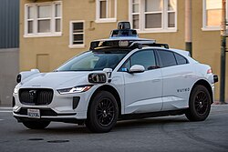 Waymo robotaxi on a city street.