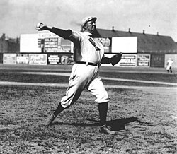 Cy Young—the holder of many major league career marks, including wins and innings pitched, as well as losses—in 1908. MLB's annual awards for the best pitcher in each league are named for Young.