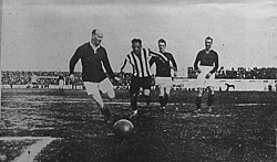 Plymouth Argyle v. Argentina national team (first match): Welsh back Moses Russell (left) fights to cut off centre-forward Gabino Sosa