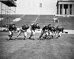The 1961 Chicago Bears practicing for the Armed Forces Benefit Football Game, which was primarily held at Soldier Field from 1947 to 1970. The Bears permanently moved to Soldier Field in 1971.