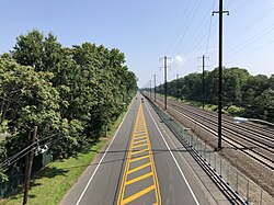 Route 27 northbound at CR 650 (New Dover Road) in Woodbridge Township, running parallel to the Northeast Corridor rail line