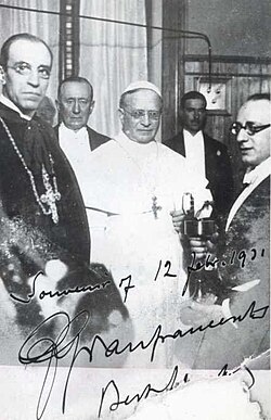 Pius XI (center) with Cardinal Pacelli (front left), the radio transmission pioneer Guglielmo Marconi (back left) and others at the inauguration of Vatican Radio on 12 February 1931
