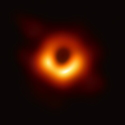 A bright ring of material surrounding a dark center that marks the shadow of the M87's supermassive black hole. The image also provided a key confirmation of General relativity.[119]