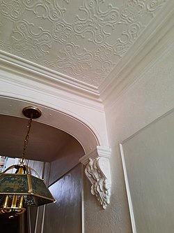 Decorative plaster moldings and coving in a late Victorian town house in South Wales.
