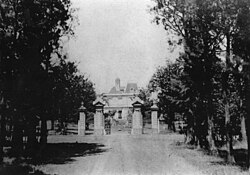 Estancia Echeverry (early 20th century): gate and manor house.