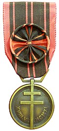 Médaille de la Résistance with a large rosette attached to the medal's suspension ribbon. Smaller rosettes are usually worn separately.