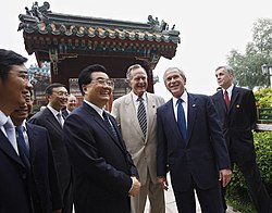 Hu with U.S. President George W. Bush and former U.S. president George H. W. Bush in Beijing, 10 August 2008