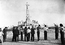 "Execution" of the Sacred Heart of Jesus by Communist militiamen. The photograph in the London Daily Mail had the caption "Spanish Reds' war on religion".[433]