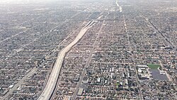 Many areas are completely filled with houses, buildings, roads, and freeways as observed in Vermont Vista, a Los Angeles neighborhood.