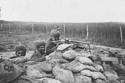 A Benét–Mercié machine gun section of 2nd Rajput Light Infantry in action in Flanders, during the winter of 1914–15
