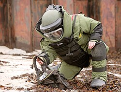 Technical textile is a branch of textile that focuses on the protection, safety and other functional performance attributes of textiles, unlike domestic textiles, where the primary focus is aesthetics and comfort. A technician wearing an explosive ordnance disposal (EOD) suit.