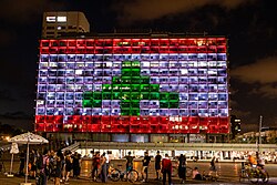 Tel Aviv City Hall, in Israel, lit up with the colours of the Lebanese flag on 5 August 2020