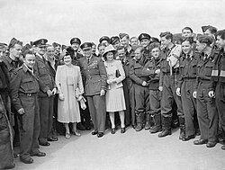 King George VI, Queen Elizabeth, and Princess Elizabeth with RAF personnel during World War II