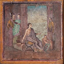 Female painter sitting on a campstool and painting a statue of Dionysus or Priapus onto a panel which is held by a boy. Fresco from Pompeii, 1st century