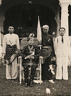 Ahmad Tajuddin, the 27th Sultan of Brunei, with members of his court in April 1941, eight months before the Japanese invaded Brunei