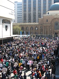 A crowd of supporters and curious onlookers outside the Johannesburg High Court during the rape trial