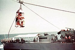 Personnel transferred from USS Rankin by highline, 1960