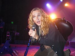 Melissa Etheridge, the first significant female figure in the genre, performing live in 2010