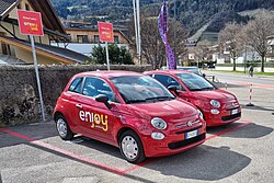 Enjoy car sharing vehicles parked at an Enjoy Point station in Italy.
