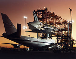 Atlantis being mated to Shuttle Carrier Aircraft N911NA using the Mate-Demate Device