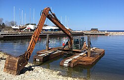 Excavator dredger in Neeme harbour, Estonia (April 2023)