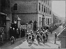 French colonial infantry marching through the French Concession in Tianjin during the Boxer Rebellion