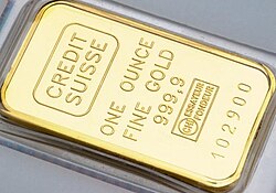 Troy ounce is a traditional unit of gold – ‌this sample marked "999,9" is four nines fine (see: Fineness § Gold), meaning it is pure to 999.9 parts in 1,000 (i.e.99.99% pure)