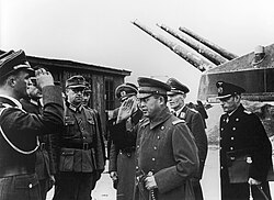 Japanese Military Attaché, Makoto Onodera, visiting Fjell Fortress in Norway, 1943. Behind him is Lieutenant Colonel Eberhard Freiherr von Zedlitz und Neukrich (C-in-C Luftwaffe Feldregiment 502.), and to the right is Fregattenkapitän doktor Robert Morath (Seekommandant in Bergen). Behind Onoderas hand (raised in salute) is General Nikolaus von Falkenhorst (C-in-C German military forces in Norway).