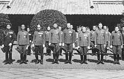 Korean royalty of the House of Yi (front row, right to left): Yi Wu, Yi Geon and Yi Un as officers of the Imperial Japanese Army, together with members of the Japanese imperial family at the Yasukuni Shrine, 1938