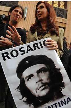 Former Argentine president Cristina Fernández de Kirchner with a poster of Che Guevara, 2009.
