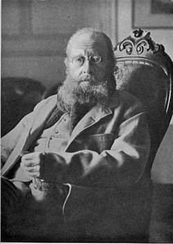 Lear in 1887, a year before his death. His arm was bent as he was holding his cat, Foss, who leapt away.